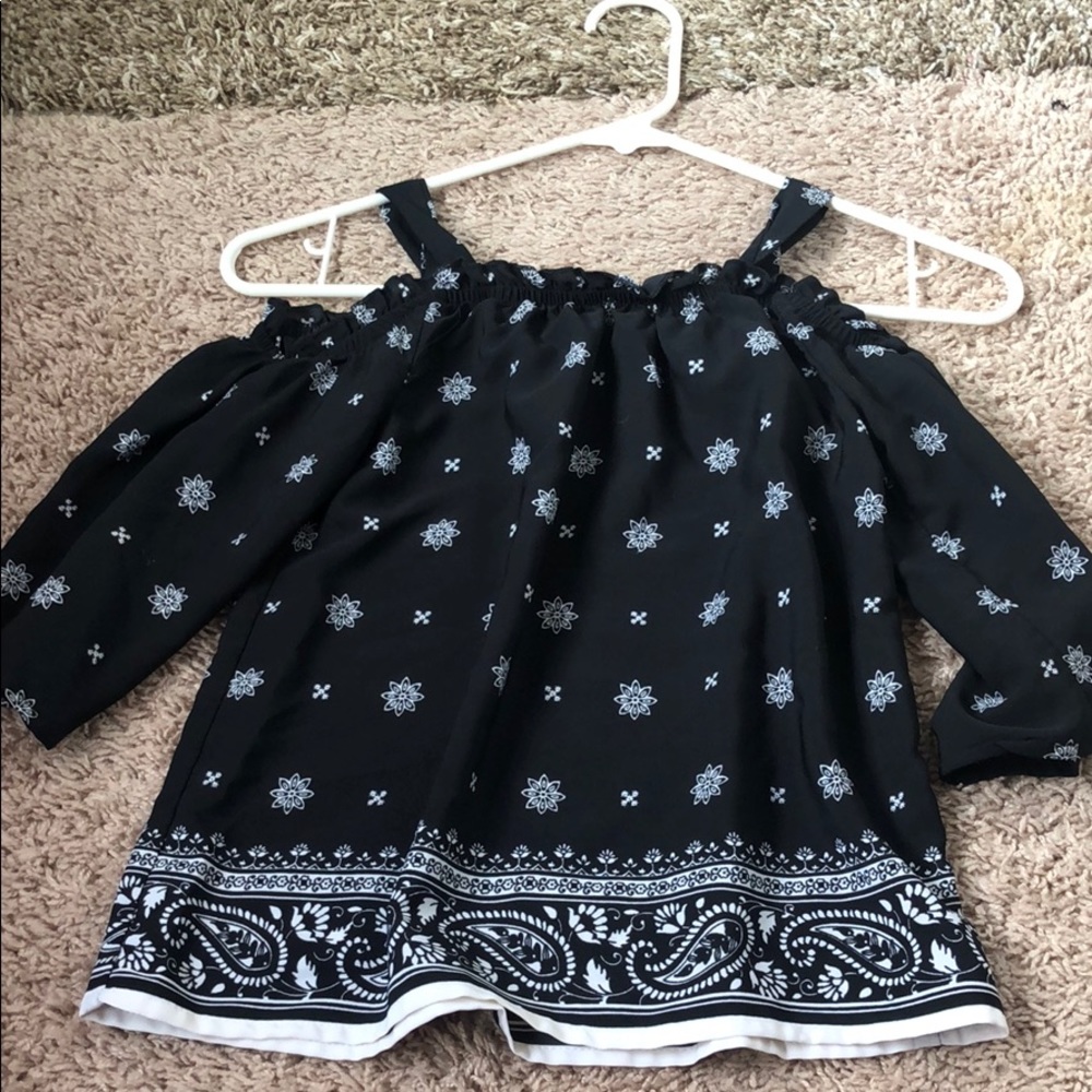 Off the shoulder shirt.